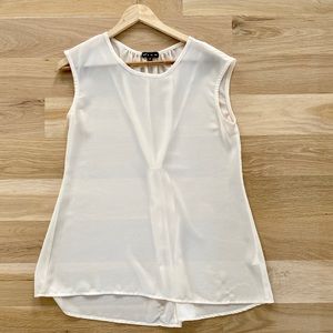 Cream sleeveless, semi-sheer, flowy blouse